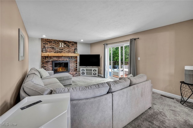 3895 Mars Dr, Brunswick, OH 44212 - living room featuring carpet, baseboards, a brick fireplace, and recessed lighting