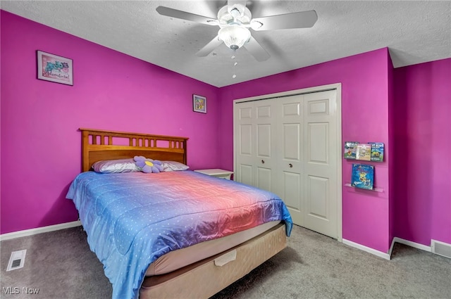 3895 Mars Dr, Brunswick, OH 44212 - bedroom with carpet floors, a textured ceiling, a closet, baseboards, and ceiling fan