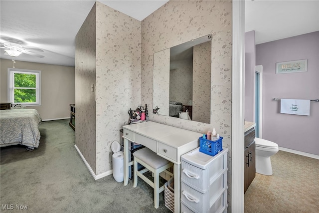 3895 Mars Dr, Brunswick, OH 44212 - bathroom with ensuite bath, toilet, ceiling fan, baseboards, and wallpapered walls