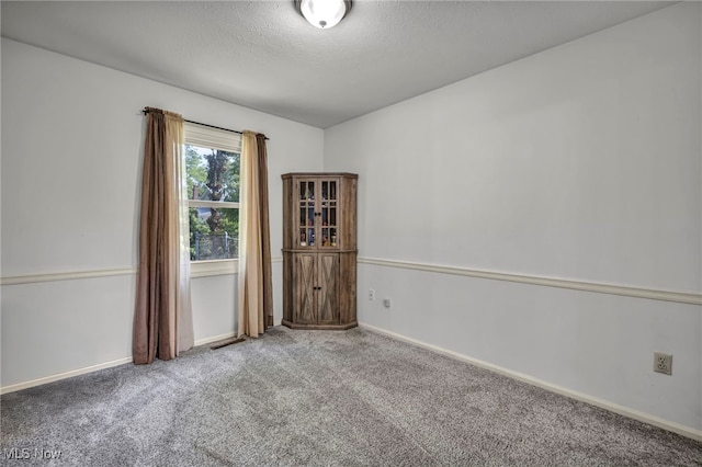 3895 Mars Dr, Brunswick, OH 44212 - unfurnished room featuring carpet floors, a textured ceiling, and baseboards