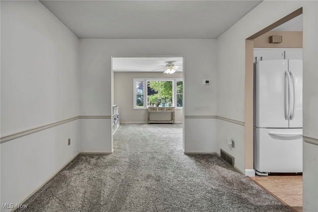 3895 Mars Dr, Brunswick, OH 44212 - spare room featuring a ceiling fan, carpet, and baseboards