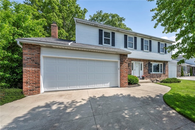 3895 Mars Dr, Brunswick, OH 44212 - view of front of home featuring concrete driveway, brick siding, a chimney, and a garage