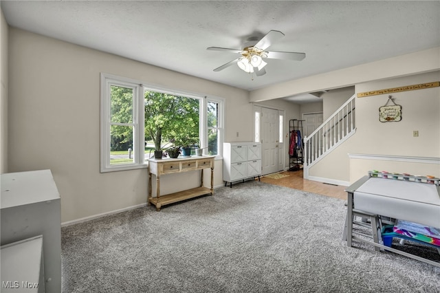3895 Mars Dr, Brunswick, OH 44212 - carpeted foyer entrance with ceiling fan, stairs, and baseboards