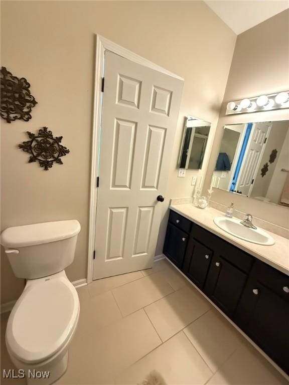 5645 Clingan Rd Unit 2D, Struthers, OH 44471 - bathroom with vanity, tile patterned flooring, and toilet