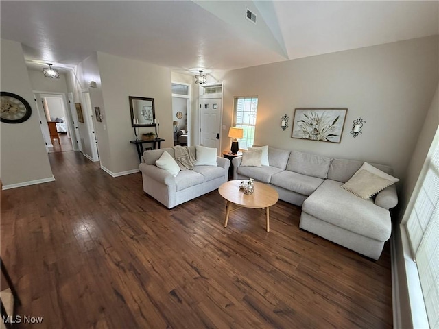 5645 Clingan Rd Unit 2D, Struthers, OH 44471 - living area featuring dark wood-type flooring and baseboards