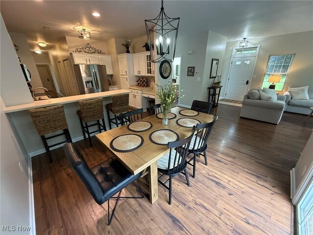 5645 Clingan Rd Unit 2D, Struthers, OH 44471 - dining room featuring wood finished floors and baseboards