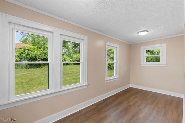159 Locust St, Wintersville, OH 43953 - unfurnished room with dark wood-style floors, baseboards, a textured ceiling, and crown molding