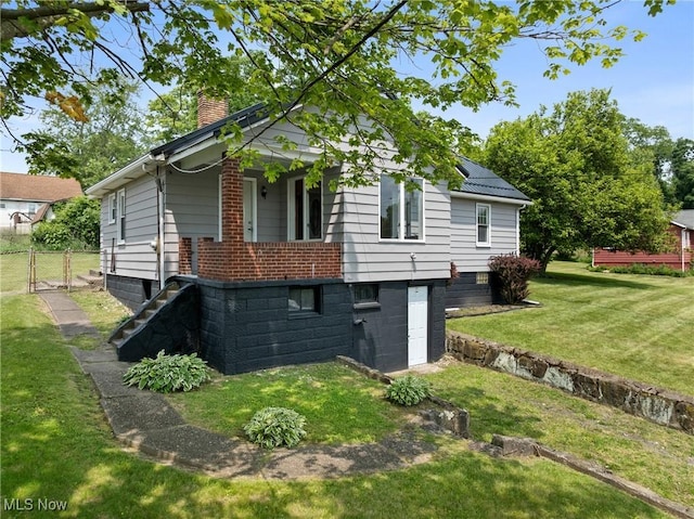159 Locust St, Wintersville, OH 43953 - view of side of property with a chimney