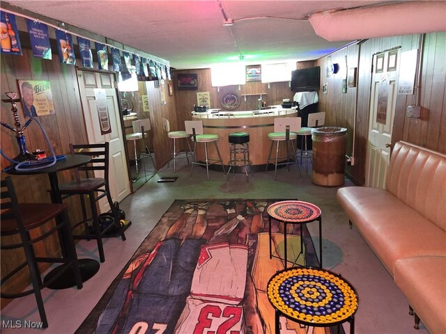 22061 Miller Ave, Euclid, OH 44119 - bar featuring concrete floors and wooden walls