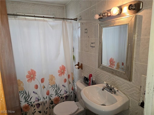 22061 Miller Ave, Euclid, OH 44119 - full bathroom with tile walls, toilet, a shower with curtain, tasteful backsplash, and a sink