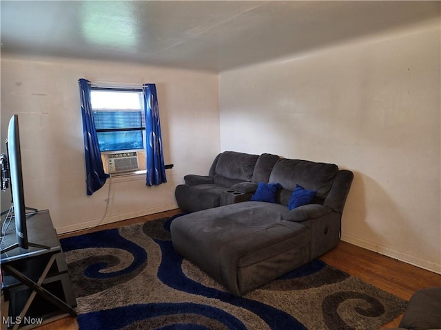 22061 Miller Ave, Euclid, OH 44119 - living area featuring wood finished floors, cooling unit, and baseboards