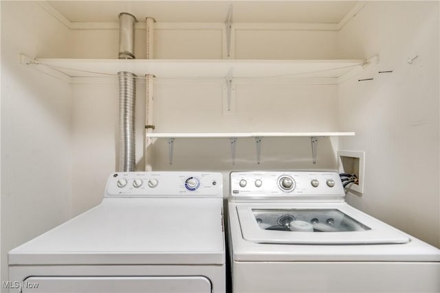 165 Woodbury Glen St, Hartville, OH 44632 - washroom with washer and dryer