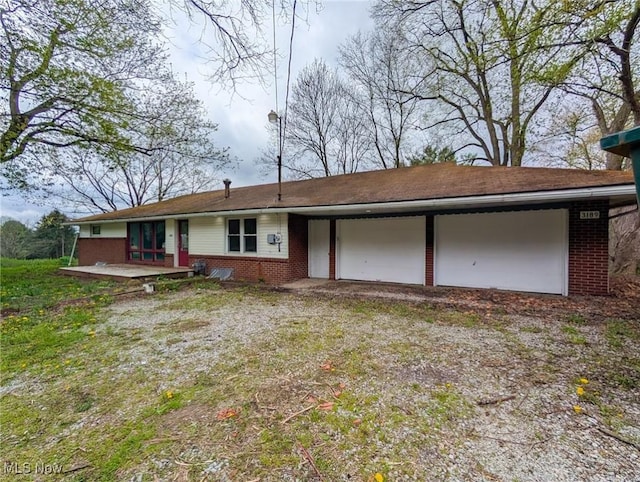 3189 Union Ave SE, Minerva, OH 44657 - back of house featuring brick siding
