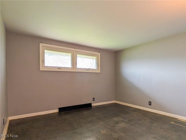 3189 Union Ave SE, Minerva, OH 44657 - spare room featuring baseboards and a baseboard heating unit