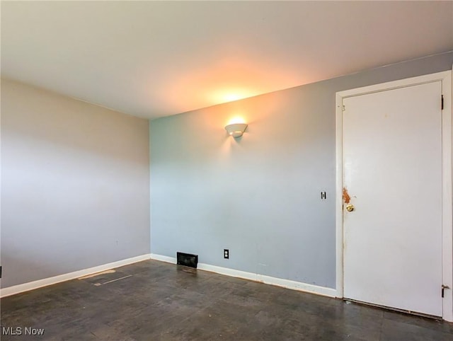 3189 Union Ave SE, Minerva, OH 44657 - unfurnished room with baseboards and concrete flooring