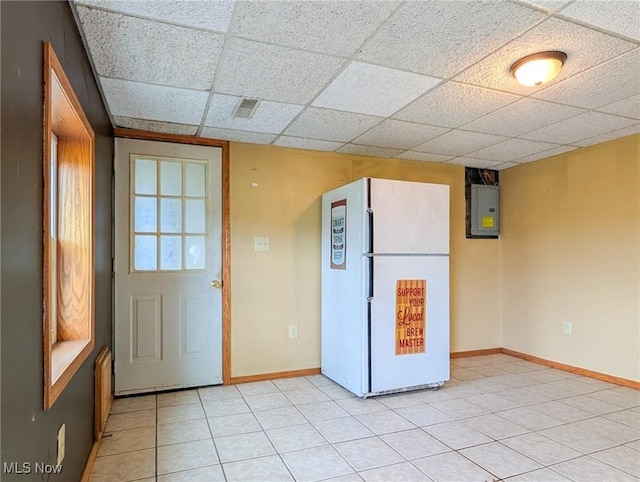 3189 Union Ave SE, Minerva, OH 44657 - foyer entrance featuring electric panel, a drop ceiling, baseboards, and light tile patterned flooring