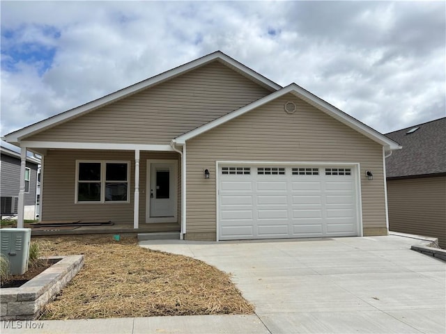 425 Thorn Way, Doylestown, OH 44230 - view of front of house with driveway, an attached garage, and covered porch