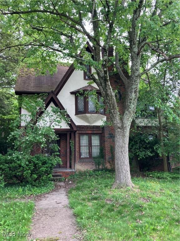2988 Ludlow Rd, Cleveland, OH 44120 - tudor home with brick siding and stucco siding