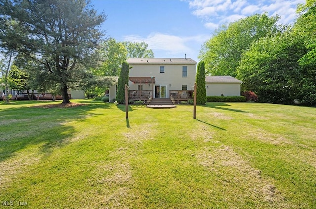 11291 Highland View Dr, Chardon, OH 44024 - back of house featuring a wooden deck and a lawn