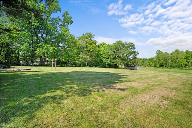11291 Highland View Dr, Chardon, OH 44024 - view of green lawn featuring a shed