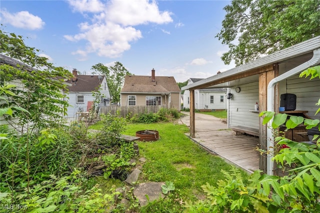 14901 Krems Ave, Maple Heights, OH 44137 - view of yard with a fire pit and a wooden deck