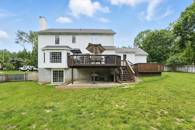 3385 Marsh Rd, Stow, OH 44224 - back of house featuring a wooden deck, stairs, and a chimney