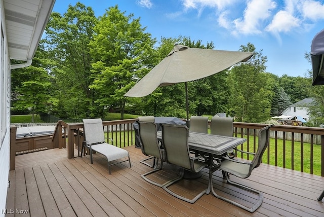 3385 Marsh Rd, Stow, OH 44224 - wooden terrace with outdoor dining area, a lawn, and a covered hot tub