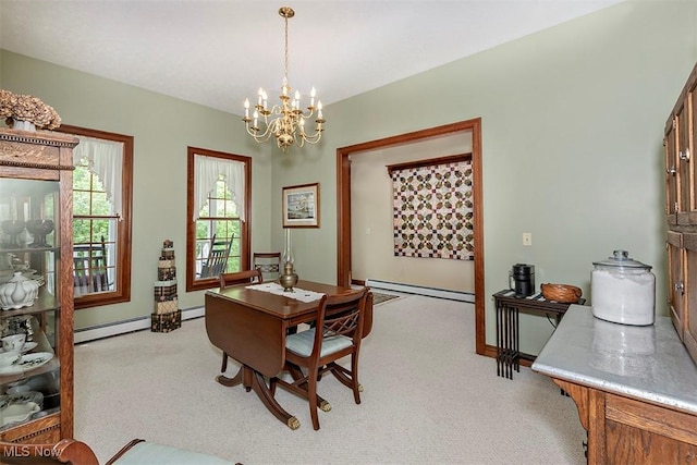 4255 River Rd, Perry, OH 44081 - dining space with a baseboard heating unit, light carpet, a chandelier, and baseboards