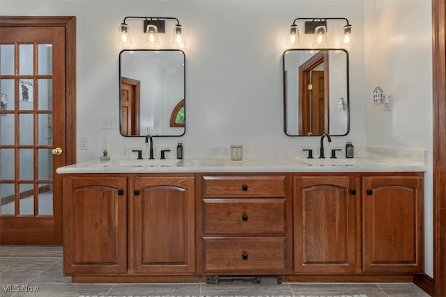 4255 River Rd, Perry, OH 44081 - full bathroom with double vanity and tile patterned flooring
