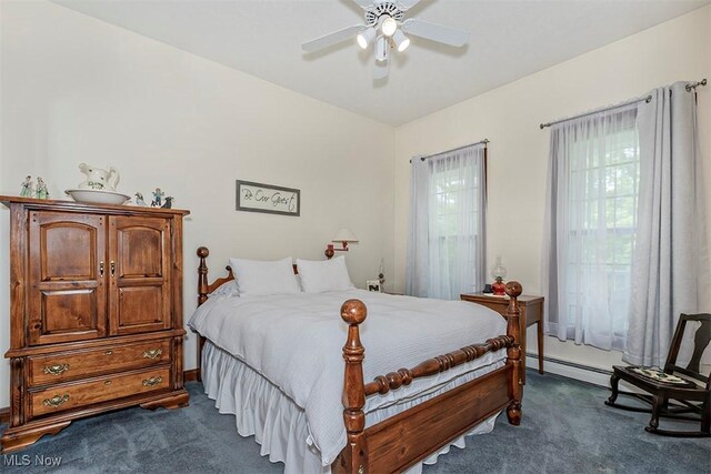 4255 River Rd, Perry, OH 44081 - carpeted bedroom featuring a ceiling fan, a baseboard heating unit, and baseboards