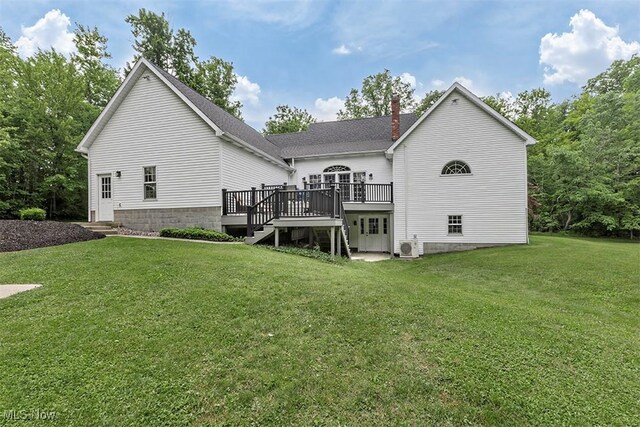 4255 River Rd, Perry, OH 44081 - back of property with a chimney, a deck, stairway, a yard, and a shingled roof