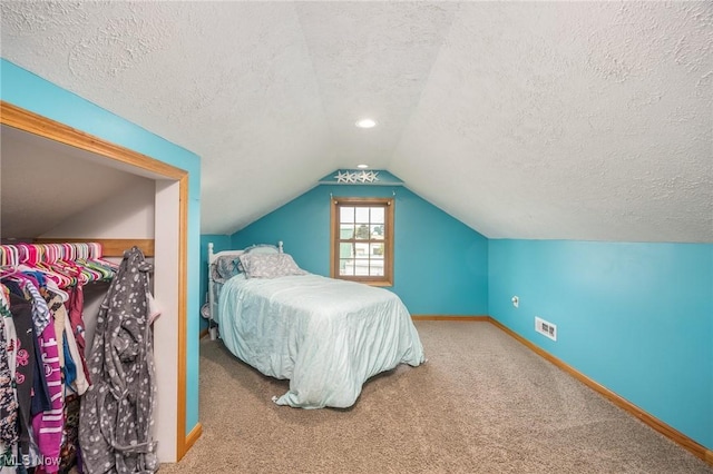 33992 Brwnsvl Co Line Rd, New Matamoras, OH 45767 - bedroom featuring vaulted ceiling, carpet, a textured ceiling, and baseboards