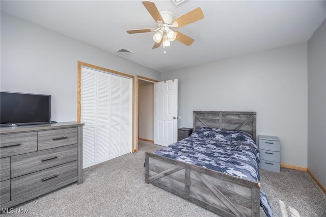 33992 Brwnsvl Co Line Rd, New Matamoras, OH 45767 - carpeted bedroom featuring a closet, ceiling fan, and baseboards