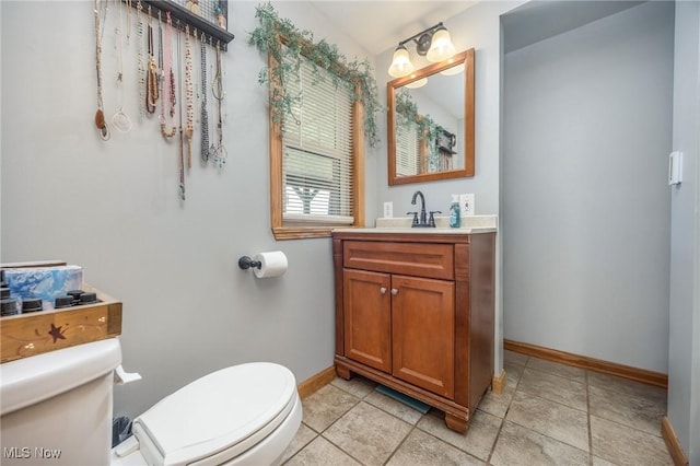 33992 Brwnsvl Co Line Rd, New Matamoras, OH 45767 - bathroom with toilet, baseboards, and vanity
