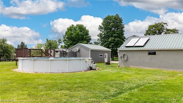 33992 Brwnsvl Co Line Rd, New Matamoras, OH 45767 - view of green lawn with an outdoor pool