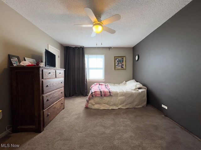6647 Avalon St NW, Canton, OH 44708 - bedroom featuring light carpet, a textured ceiling, and ceiling fan