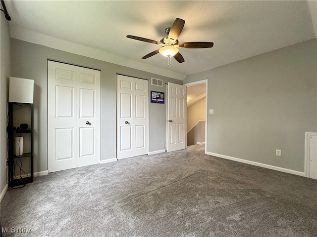 3430 E Prescott Cir, Cuyahoga Falls, OH 44223 - unfurnished bedroom with multiple closets, carpet, baseboards, and ceiling fan