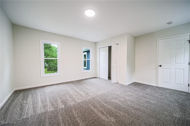 433 N Buckeye, Wooster, OH 44691 - unfurnished bedroom with baseboards, carpet, and a closet