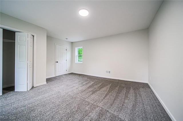 433 N Buckeye, Wooster, OH 44691 - unfurnished bedroom with carpet floors, baseboards, and a closet