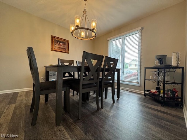 1470 Butterfield Cir, Niles, OH 44446 - dining room featuring a chandelier, baseboards, and dark wood finished floors