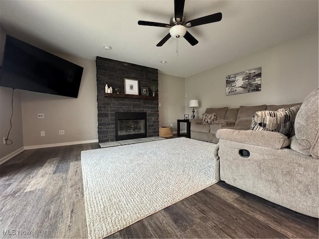 1470 Butterfield Cir, Niles, OH 44446 - living room featuring dark wood finished floors, ceiling fan, a fireplace, and baseboards