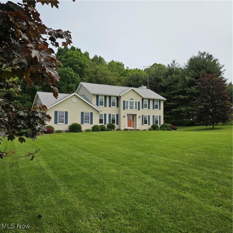 31274 Winona Rd, Salem, OH 44460 - colonial inspired home featuring a front lawn