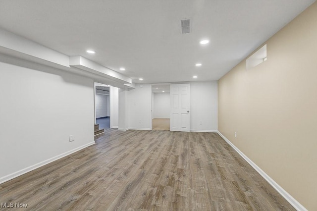 14148 Rochelle Dr, Maple Heights, OH 44137 - finished basement featuring recessed lighting, wood finished floors, and baseboards