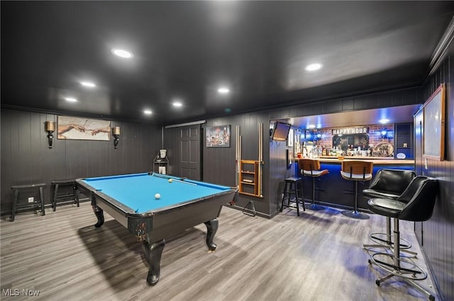 8222 Starburst Rd, Mentor, OH 44060 - recreation room featuring pool table, a bar, wood finished floors, and recessed lighting