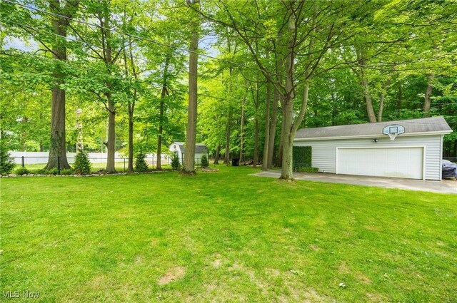 8222 Starburst Rd, Mentor, OH 44060 - view of yard with an outbuilding and a garage