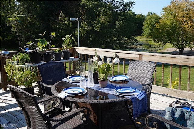 6019 New London Rd, Ashtabula, OH 44004 - wooden deck featuring outdoor dining space