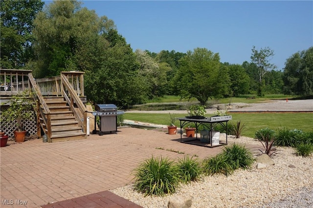6019 New London Rd, Ashtabula, OH 44004 - view of patio / terrace with stairway, a deck, and a grill