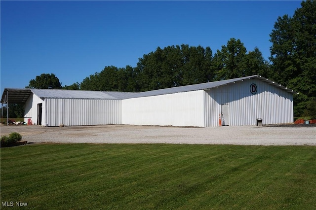 6019 New London Rd, Ashtabula, OH 44004 - view of pole building featuring a yard