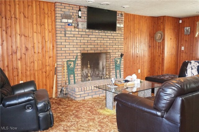 6019 New London Rd, Ashtabula, OH 44004 - living area with carpet flooring, wooden walls, and a fireplace