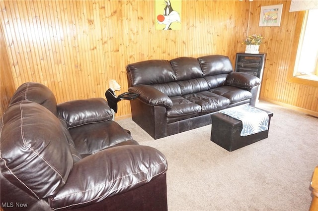 6019 New London Rd, Ashtabula, OH 44004 - carpeted living room featuring baseboards and wooden walls